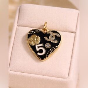 Chanel stamped Gold and Black Heart Pendant/ zipper pull/ charm